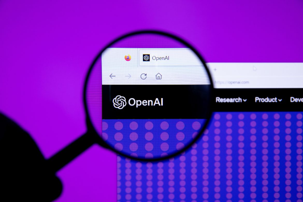 OpenAI logo with magnifying glass (52916339167)