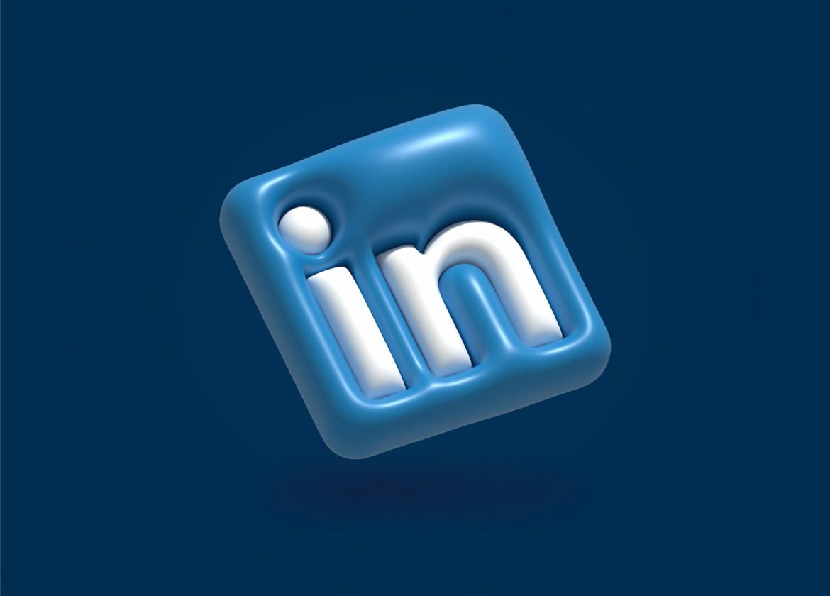 Photo by Abid Shah a blue and white linked icon on a blue background