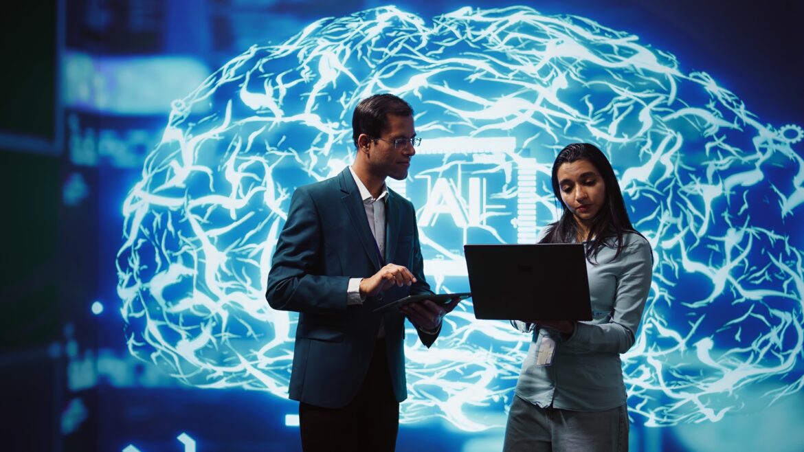 Coworkers using AI neural networks modeled after human brain, brainstorming Coworkers using AI neural networks modeled after human brain, brainstorming