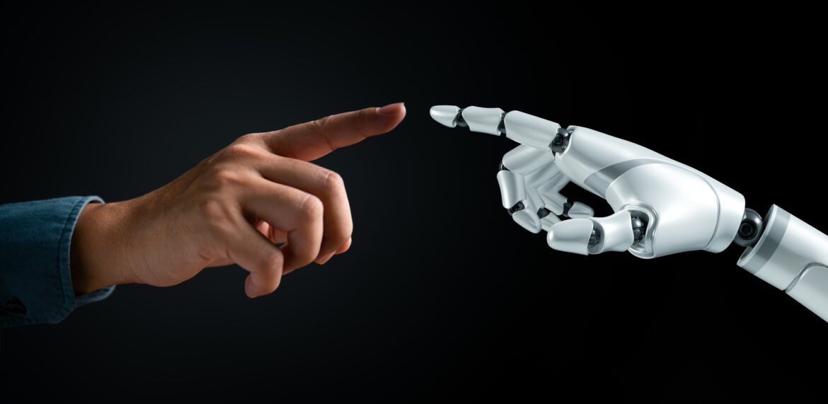 Human and robot hands reaching out to touch. Symbolizes human-AI interaction,
