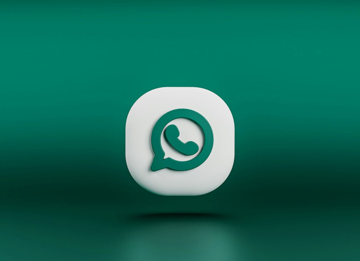 a green and white whatsapp icon on a green background