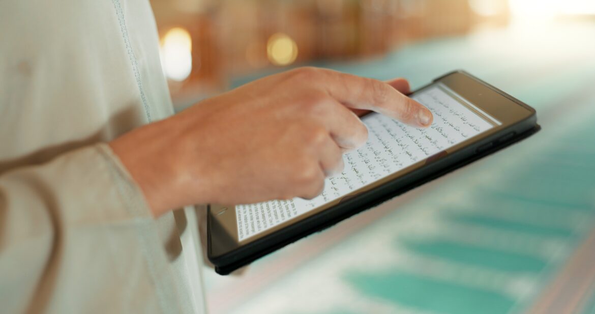 Scripture, Islam and hands with a tablet at a mosque for communication, prayer or reading on an app