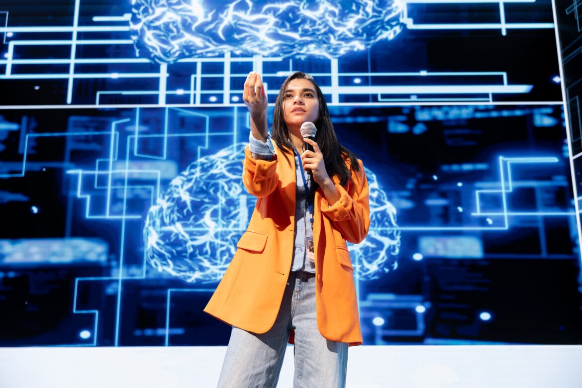 Speaker holding motivational speech at AI technology event