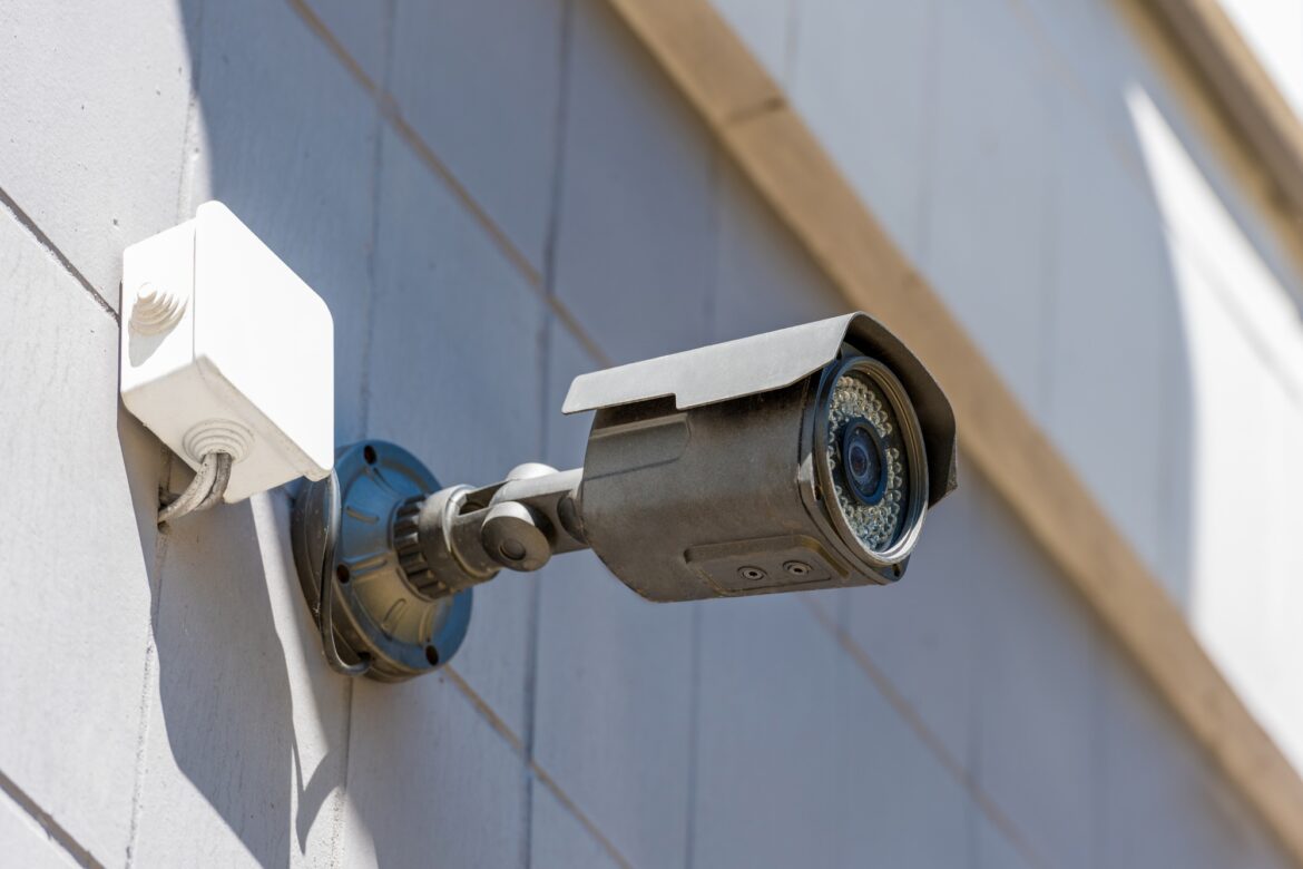 close up of security camera on wall, security system concept