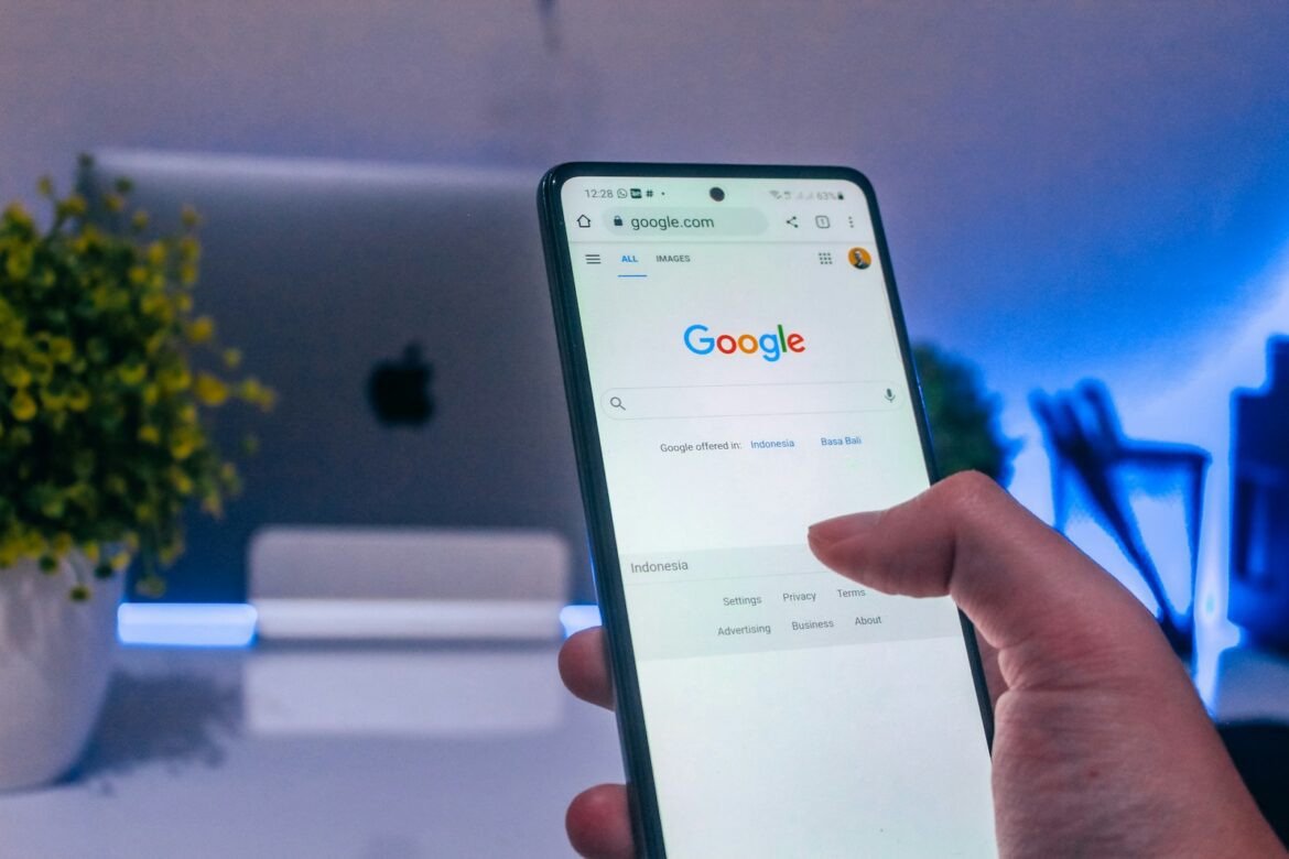 Photo by Arkan Perdana person holding white android smartphone