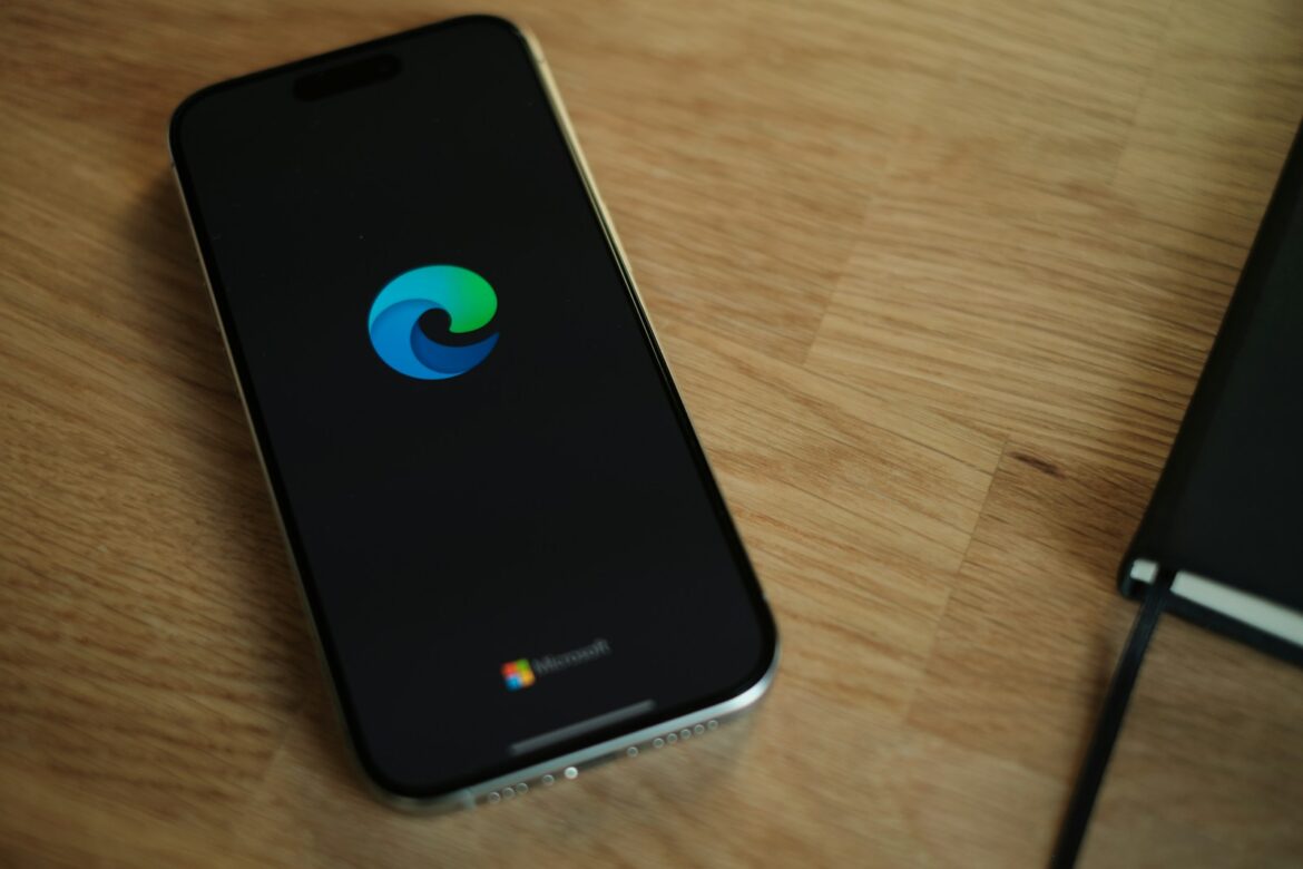 A close up of a cell phone on a table