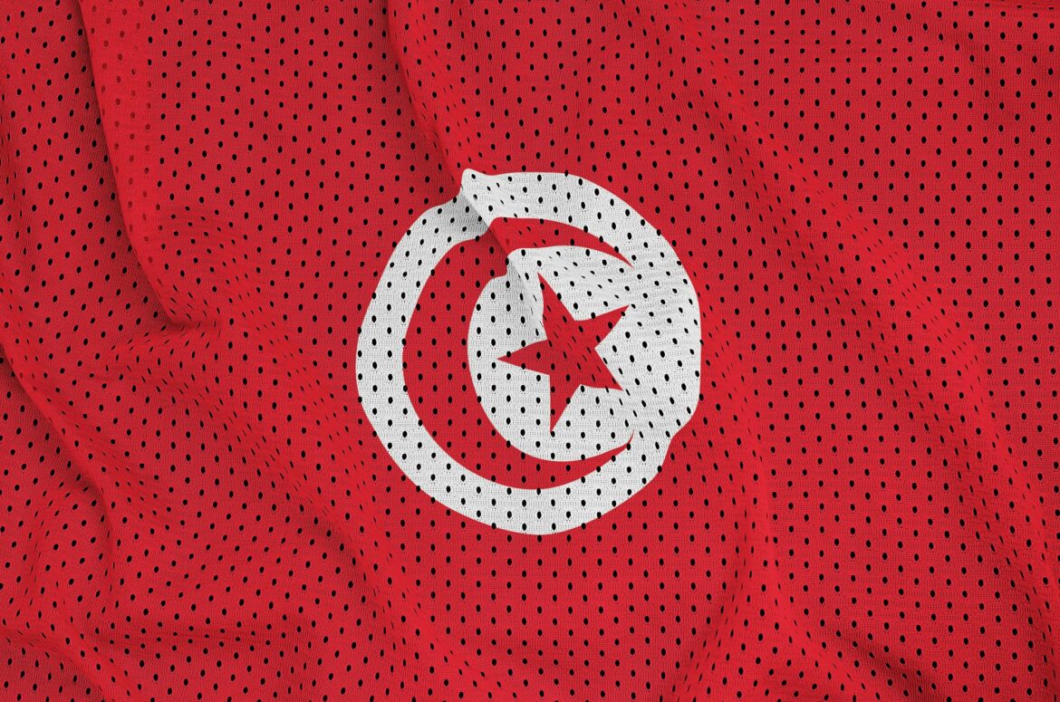 Tunisia flag printed on a polyester nylon sportswear mesh fabric with some folds