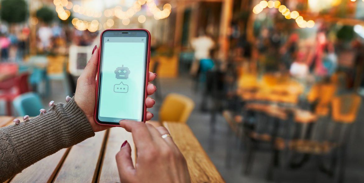 Woman takling to AI chat bot. AI bot talking to user. Using artificial intelligence chat technology