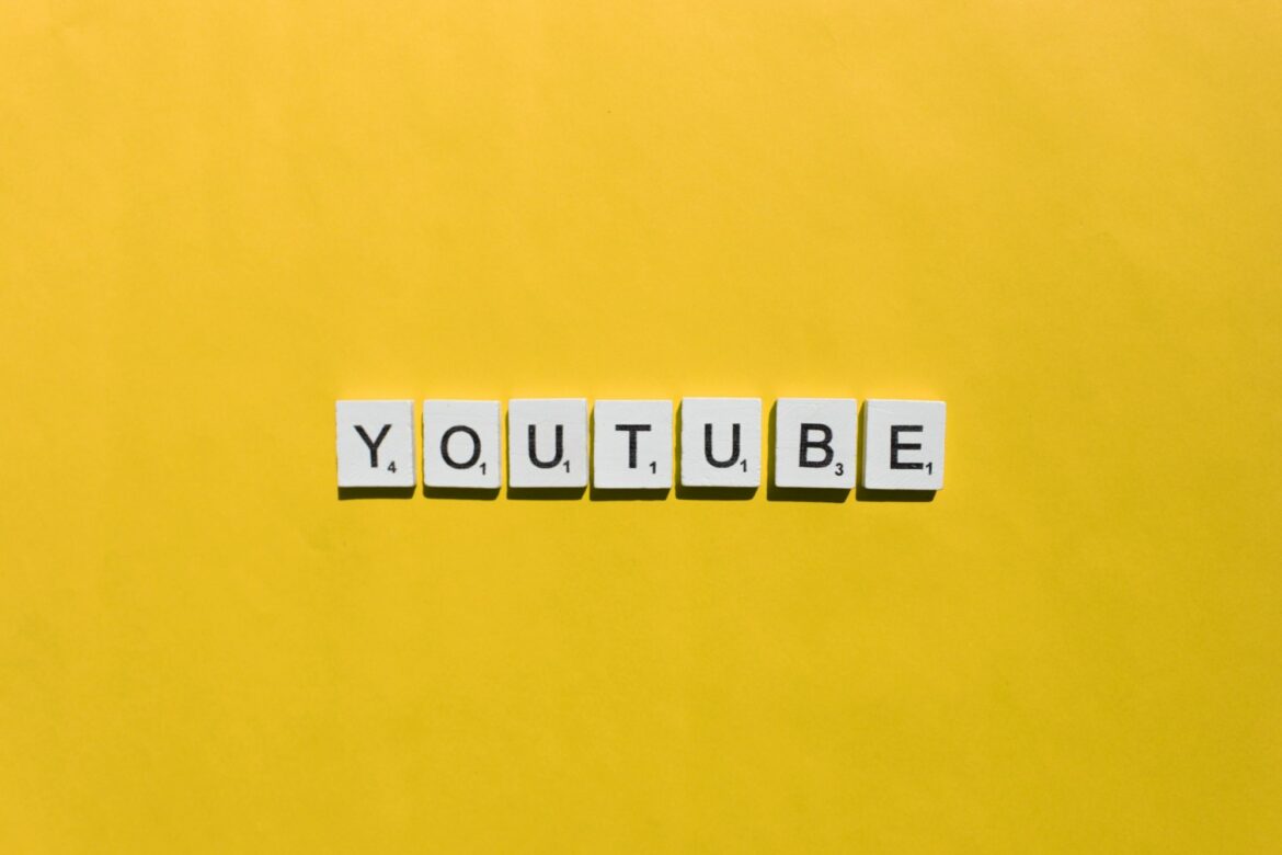 YouTube scrabble letters word on a yellow background