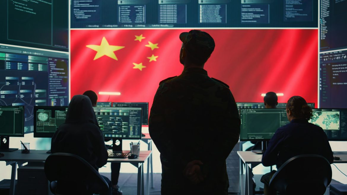 Chinese military personnel in a high tech government hacking room