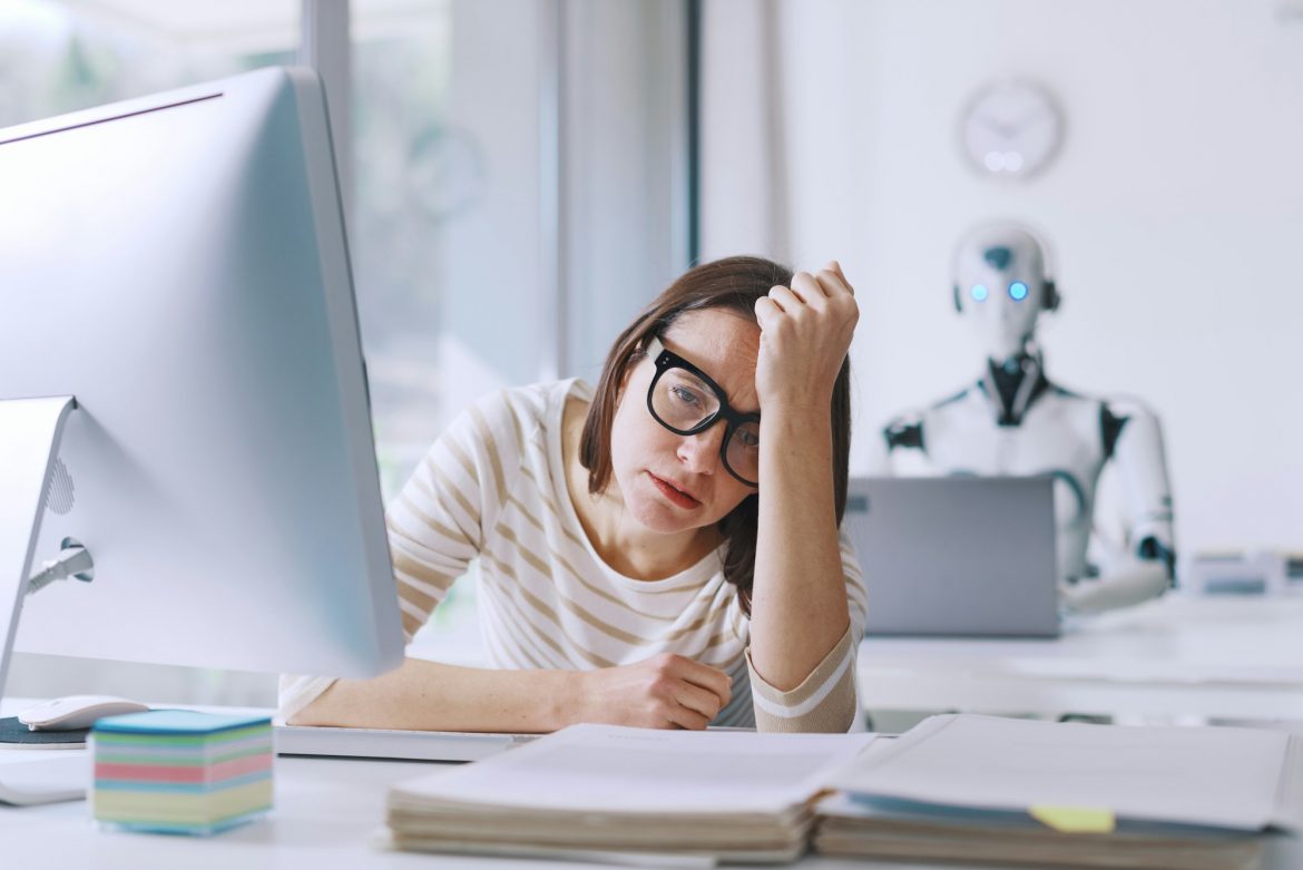 Disappointed stressed woman and AI robot in the office