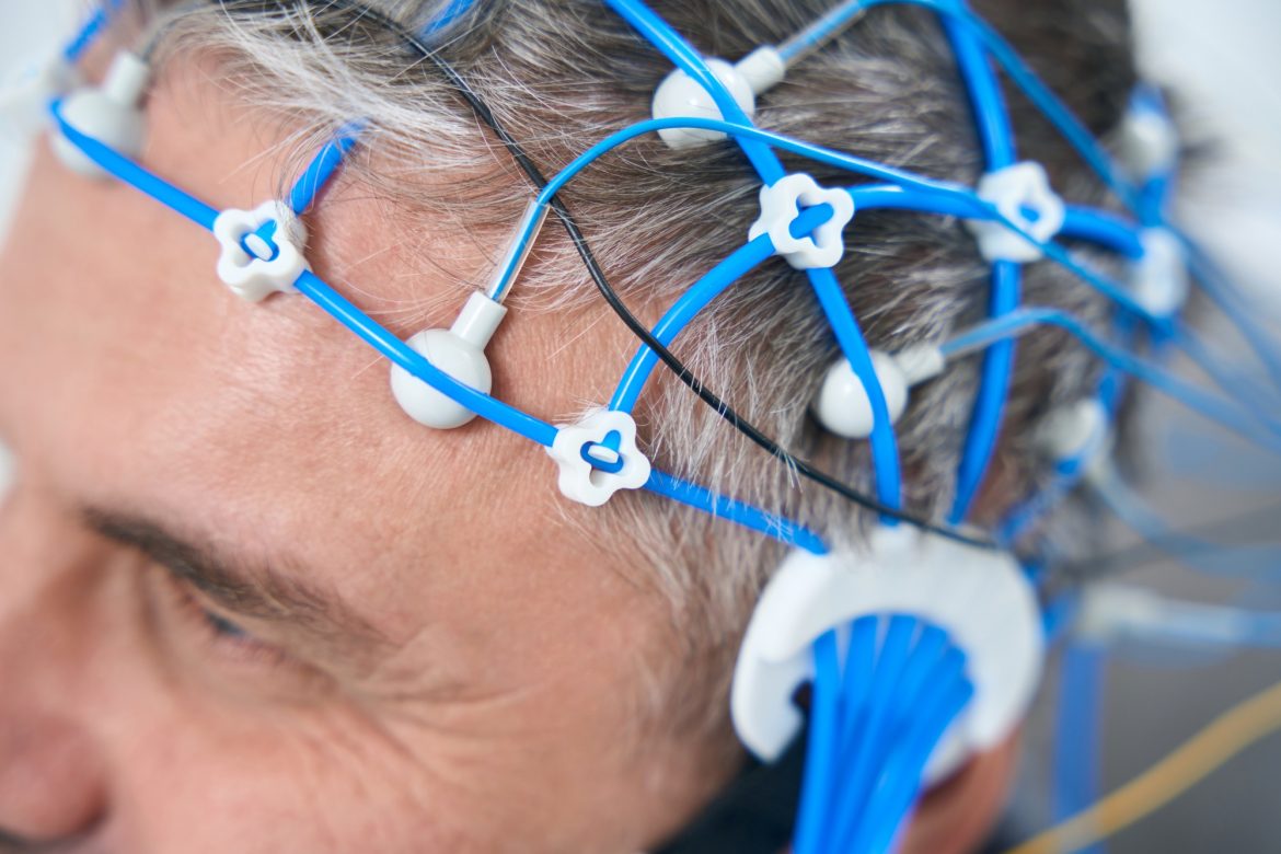 Middle-aged man on the diagnosis of EEG - electroencephalography
