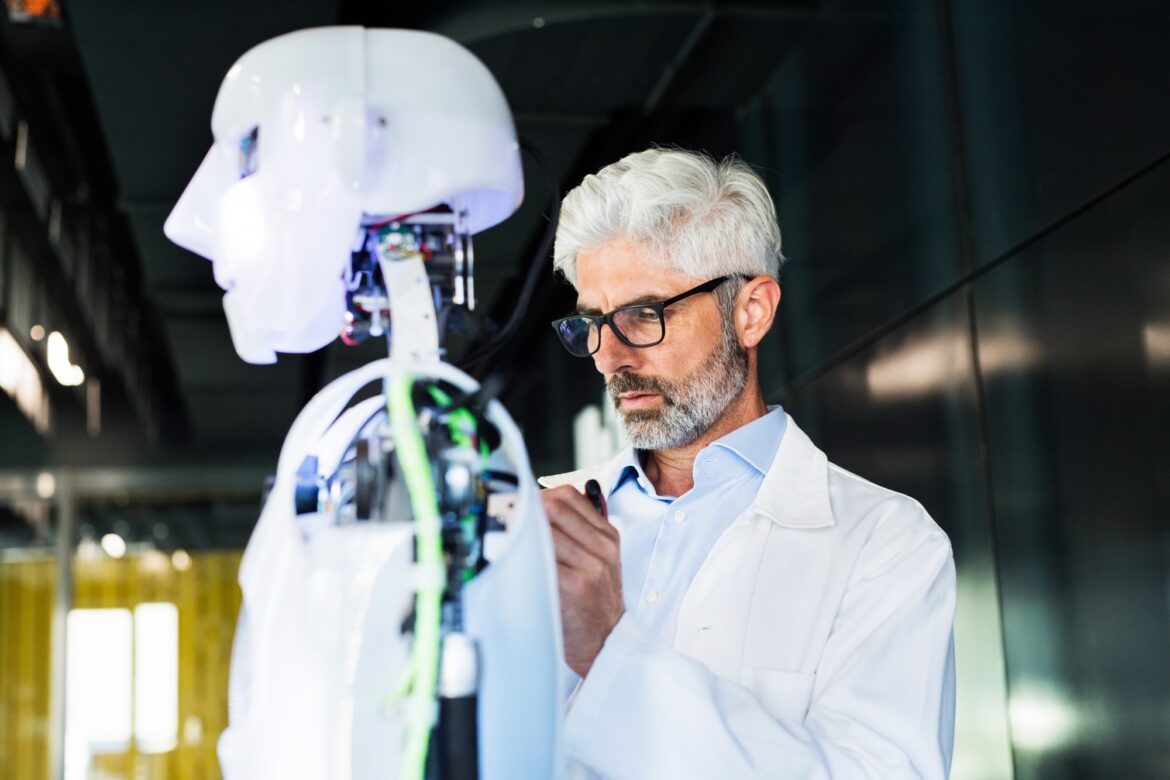 Businessman or a scientist with a robot.