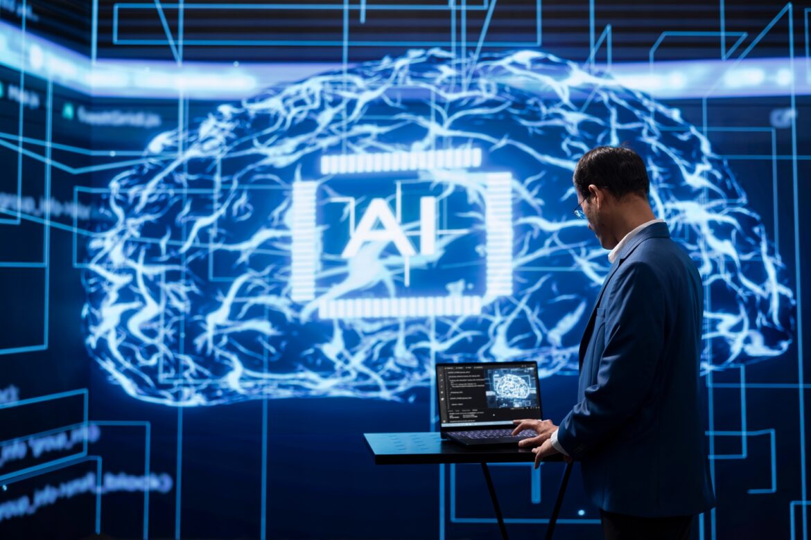 Programmer running AI cognitive computing tech on laptop