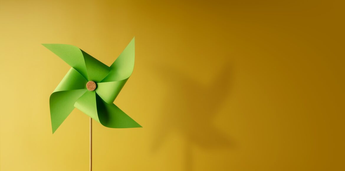 ESG and Clean Energy. Wind Turbine Paper. Decrease Carbon and Produce a Green Power