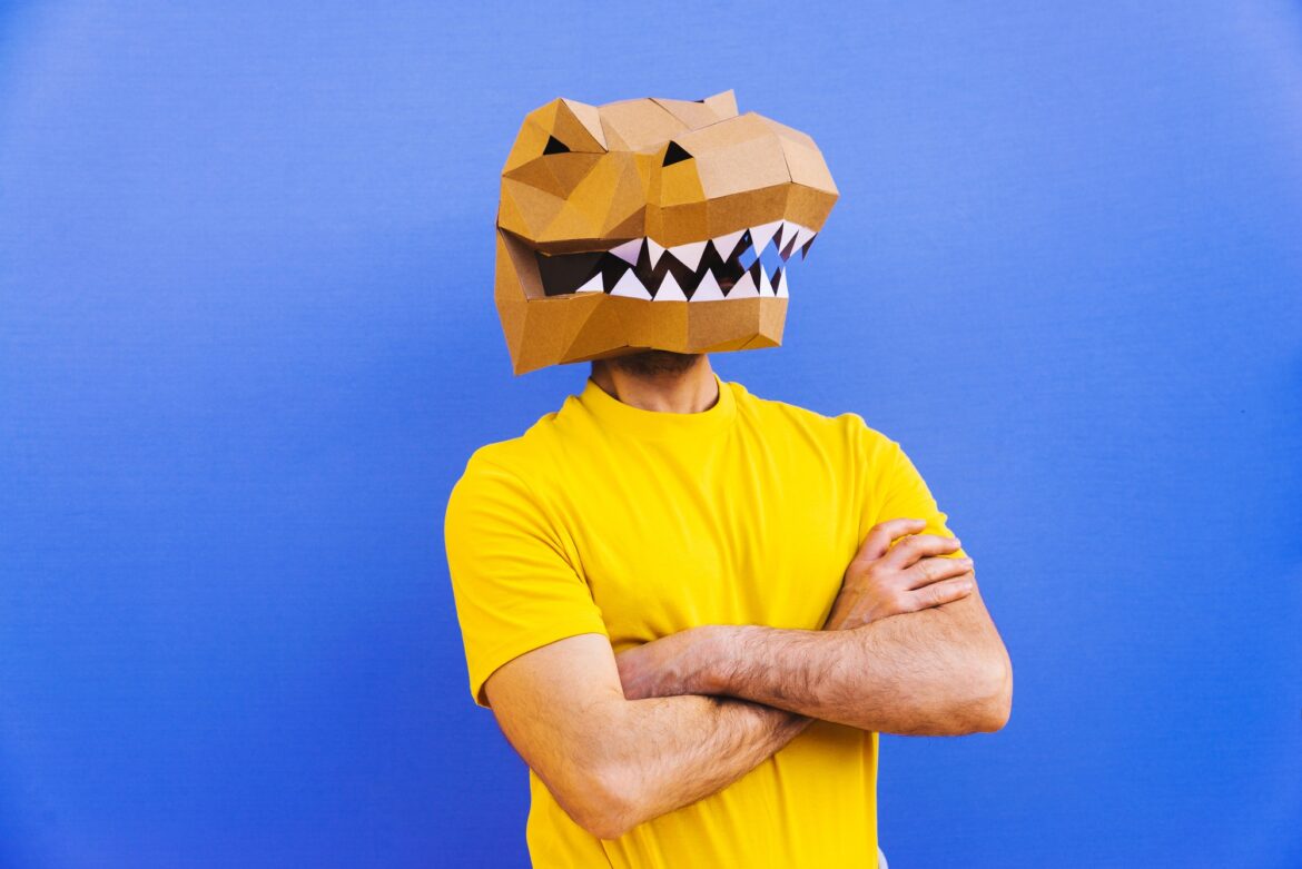 Cool man wearing 3d origami mask