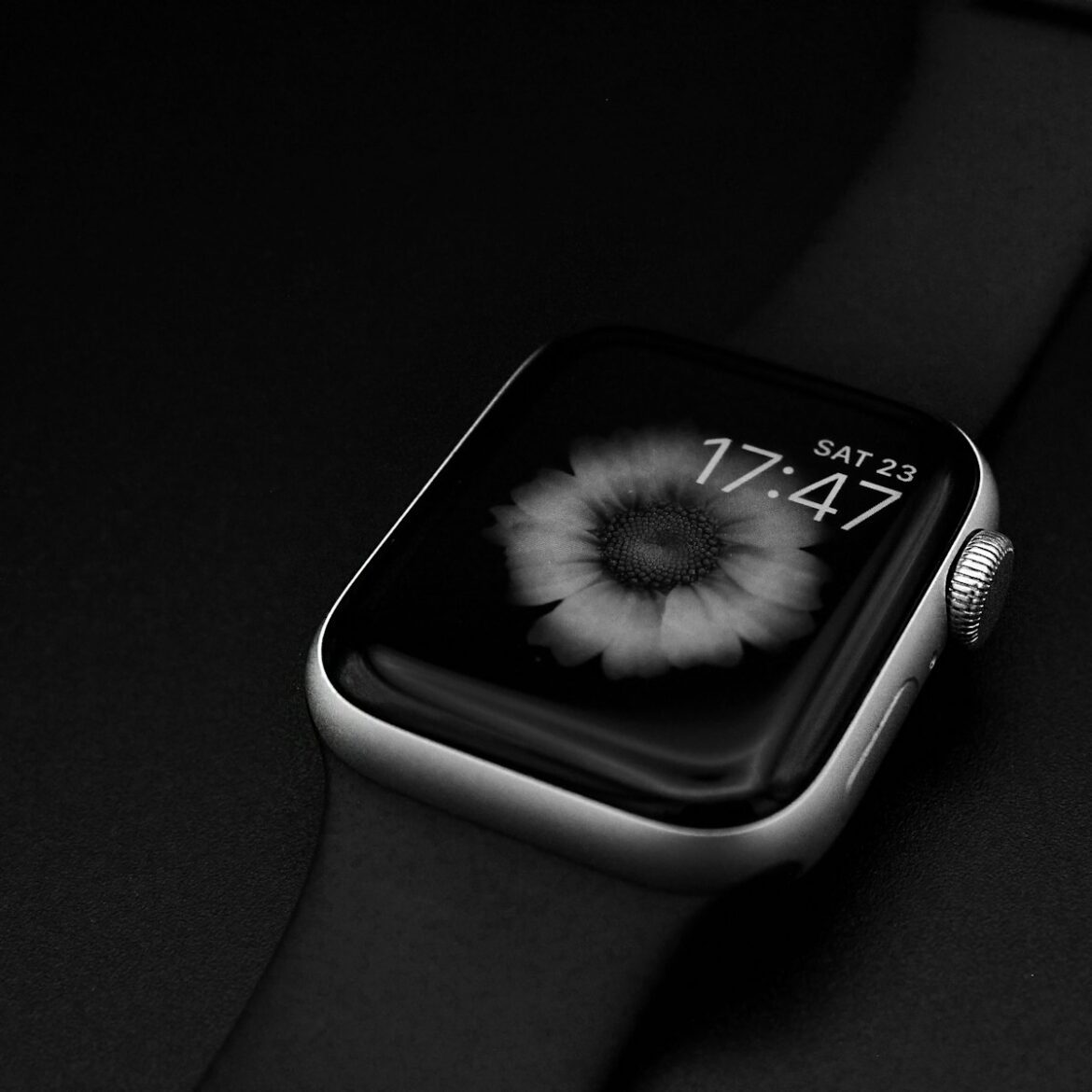 a black and white photo of an apple watch