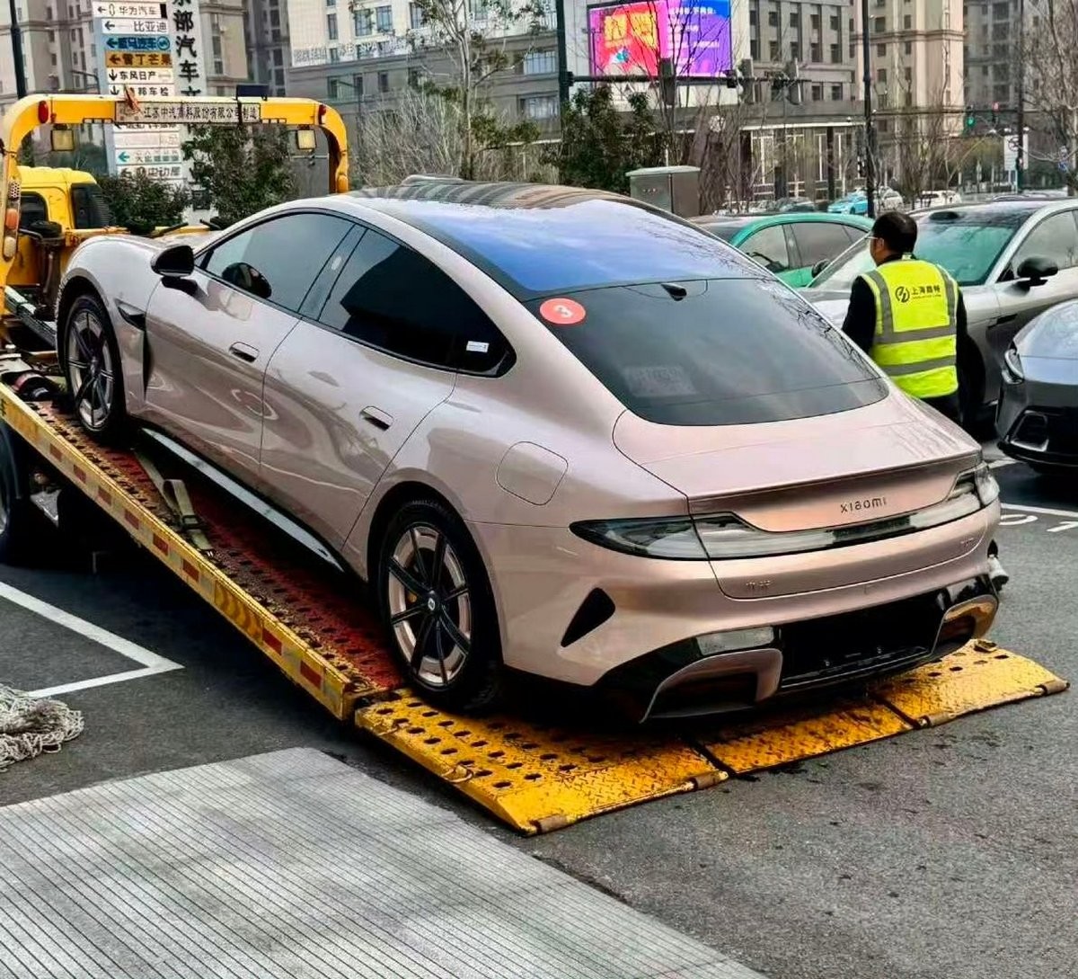 Spy photos show refreshed Xiaomi SU7 as the car starts hitting showrooms