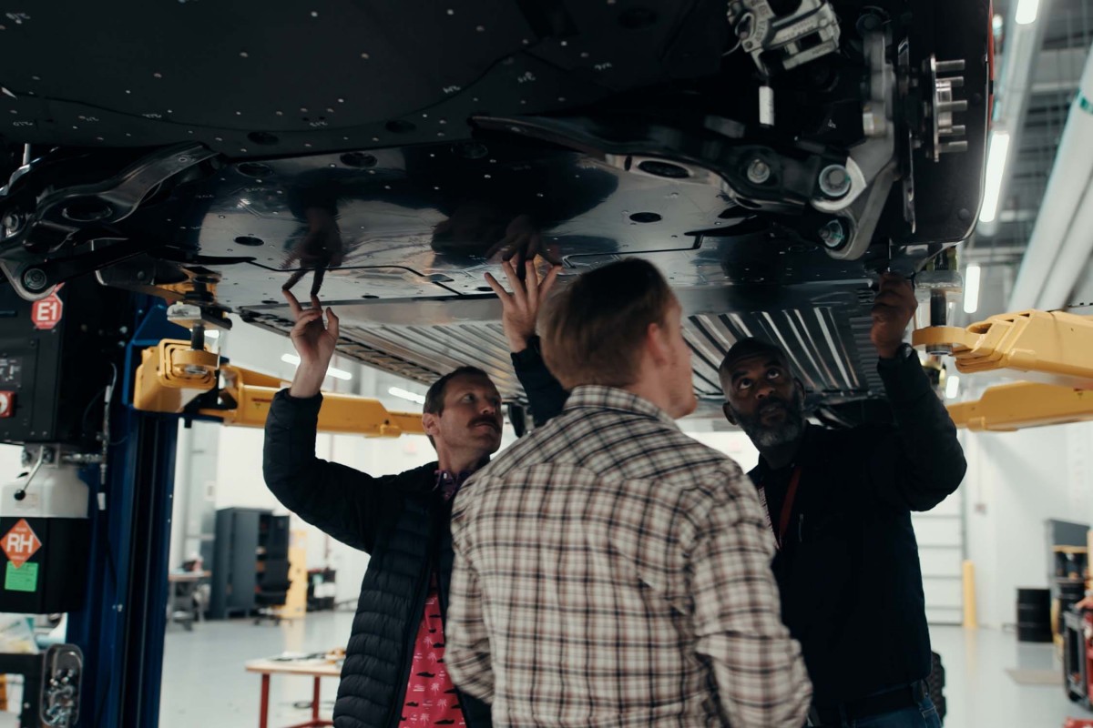 Engineers testing the underbody shield - source: Ford