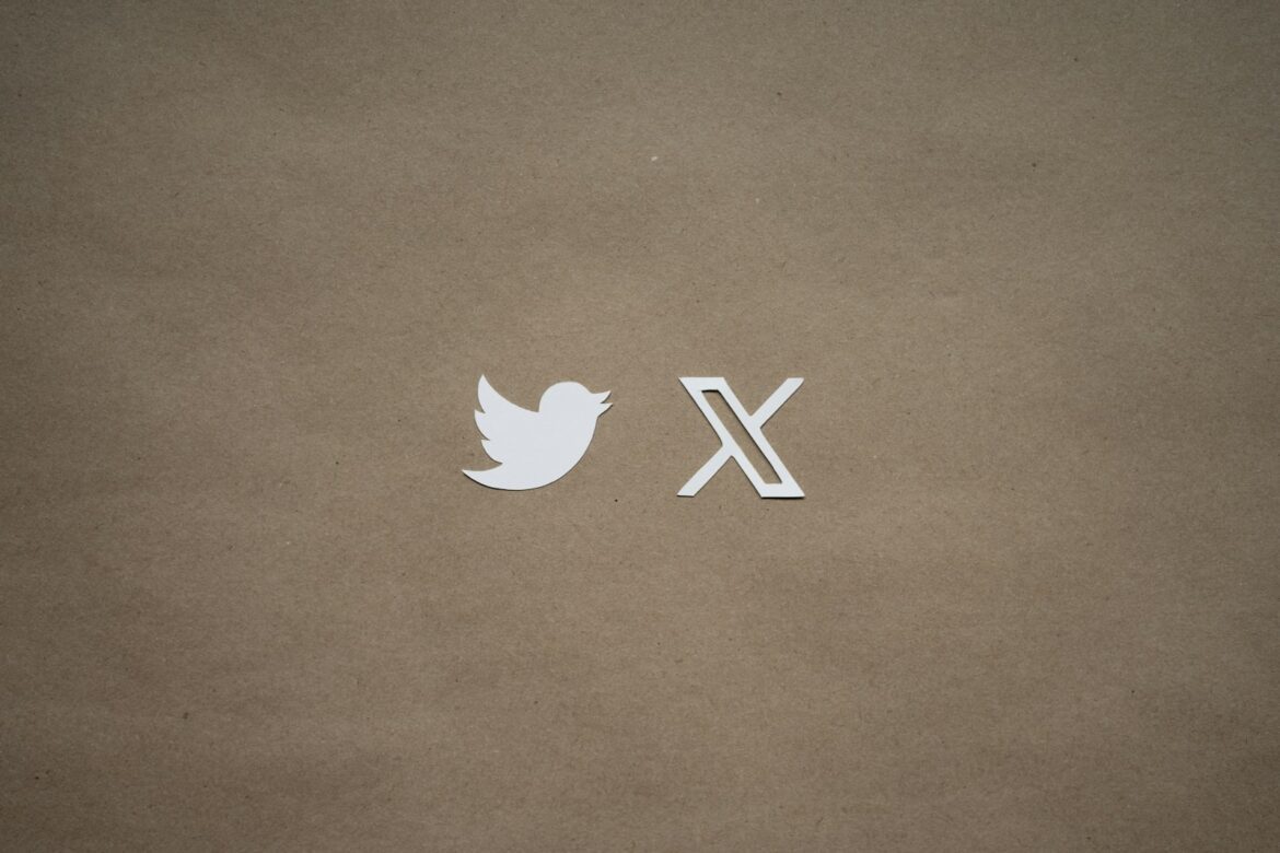 a close up of a piece of paper with a twitter logo on it